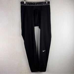 NIKE PRO TRAINING TIGHTS. Size XL. Black w/gray elastic band waistband. No snags